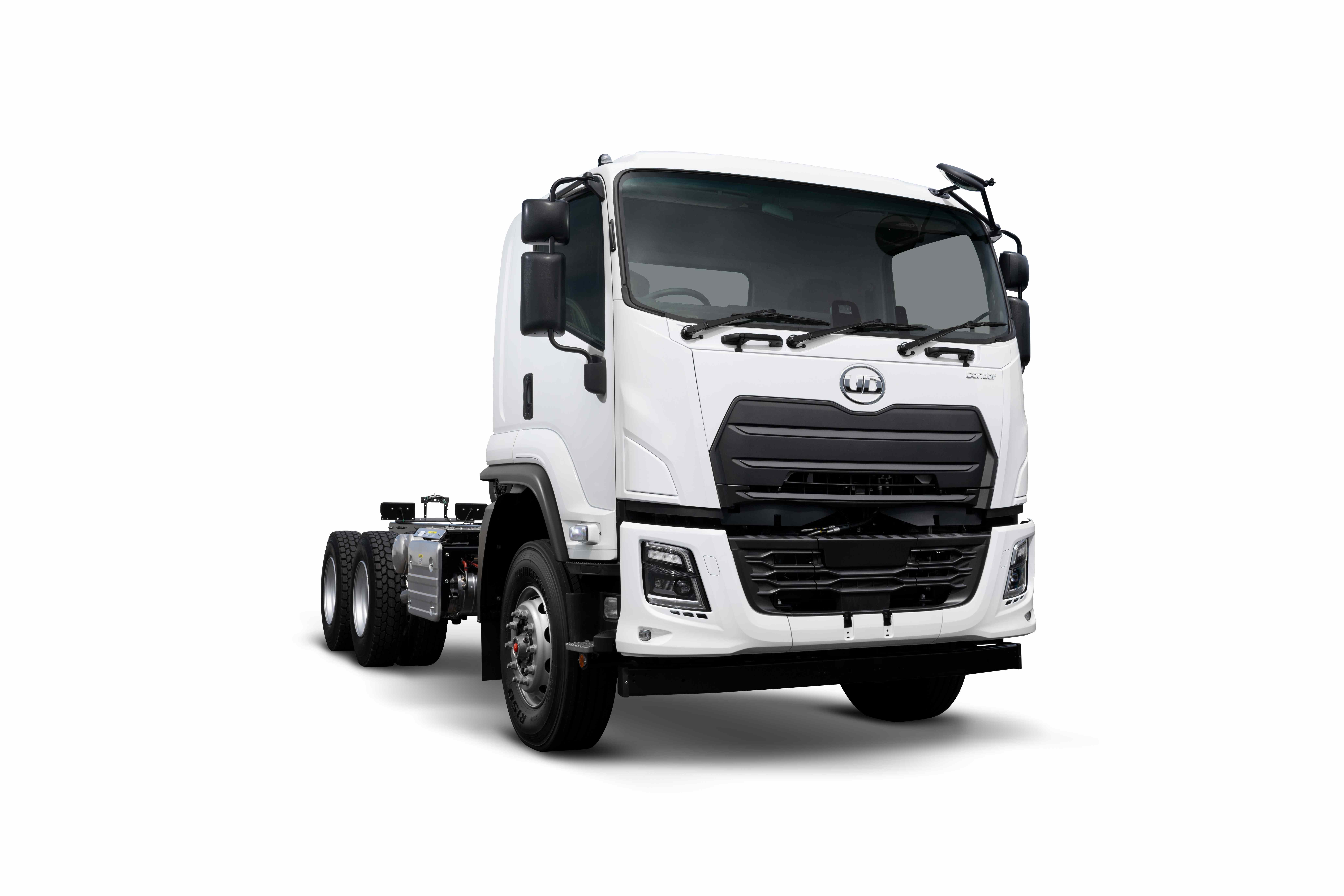 White commercial truck cab with black grille on plain background.