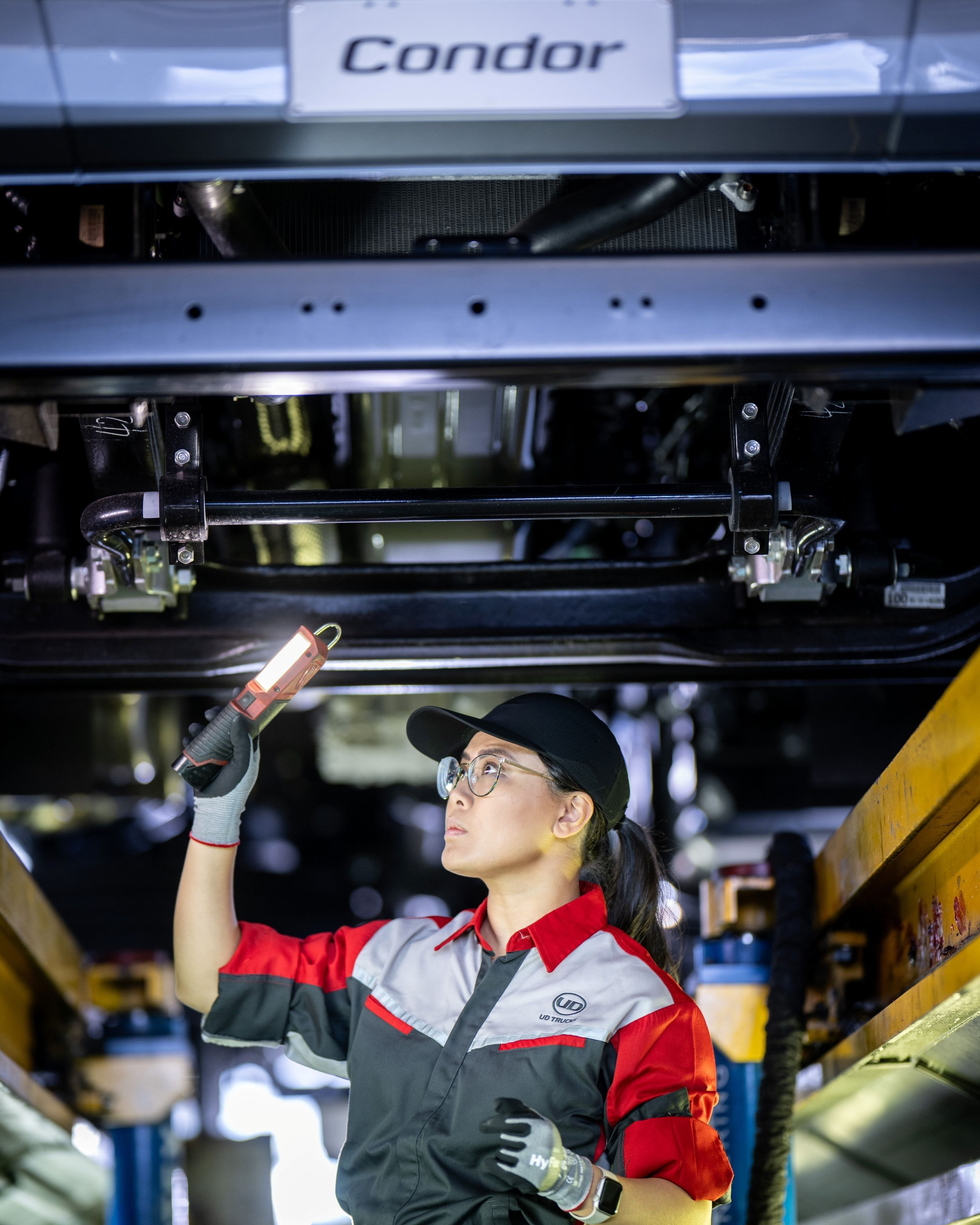 UD Trucks Condor Service Technician checking truck
